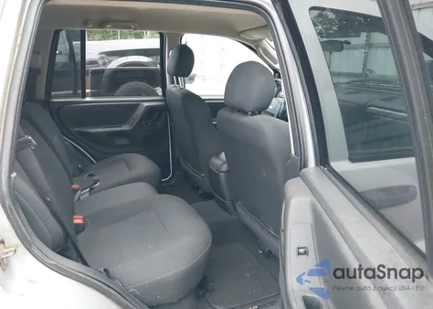 2002 Jeep Grand Cherokee Sport z USA, uszkodzony, nr VIN 1J4GX38S92C237261